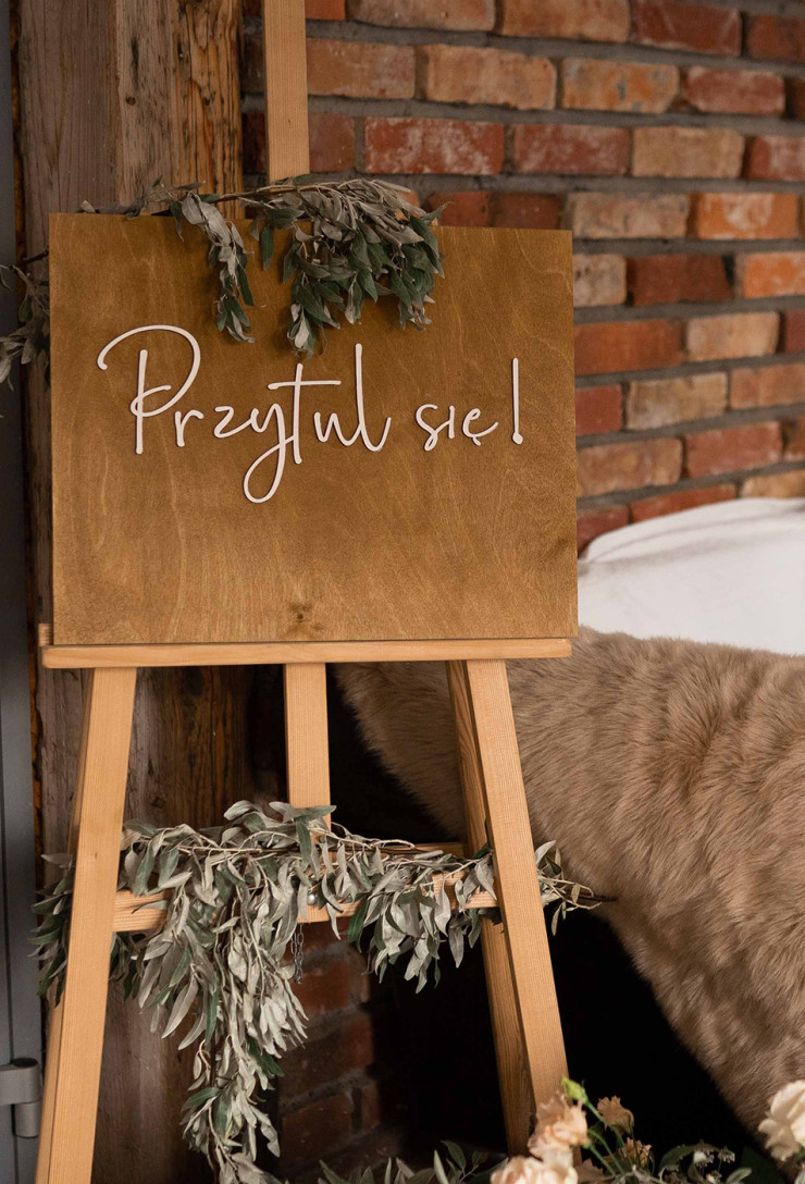 Drewniana tablica powitalna