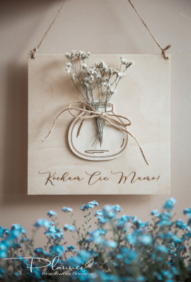 Obraz kwiatki w naczyniach